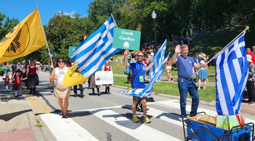 (left to right) GGAC Board Members Marina Ermidis, Jonathan Cambouris, and James Trakas leading the parade for the Greek Cultural Garden